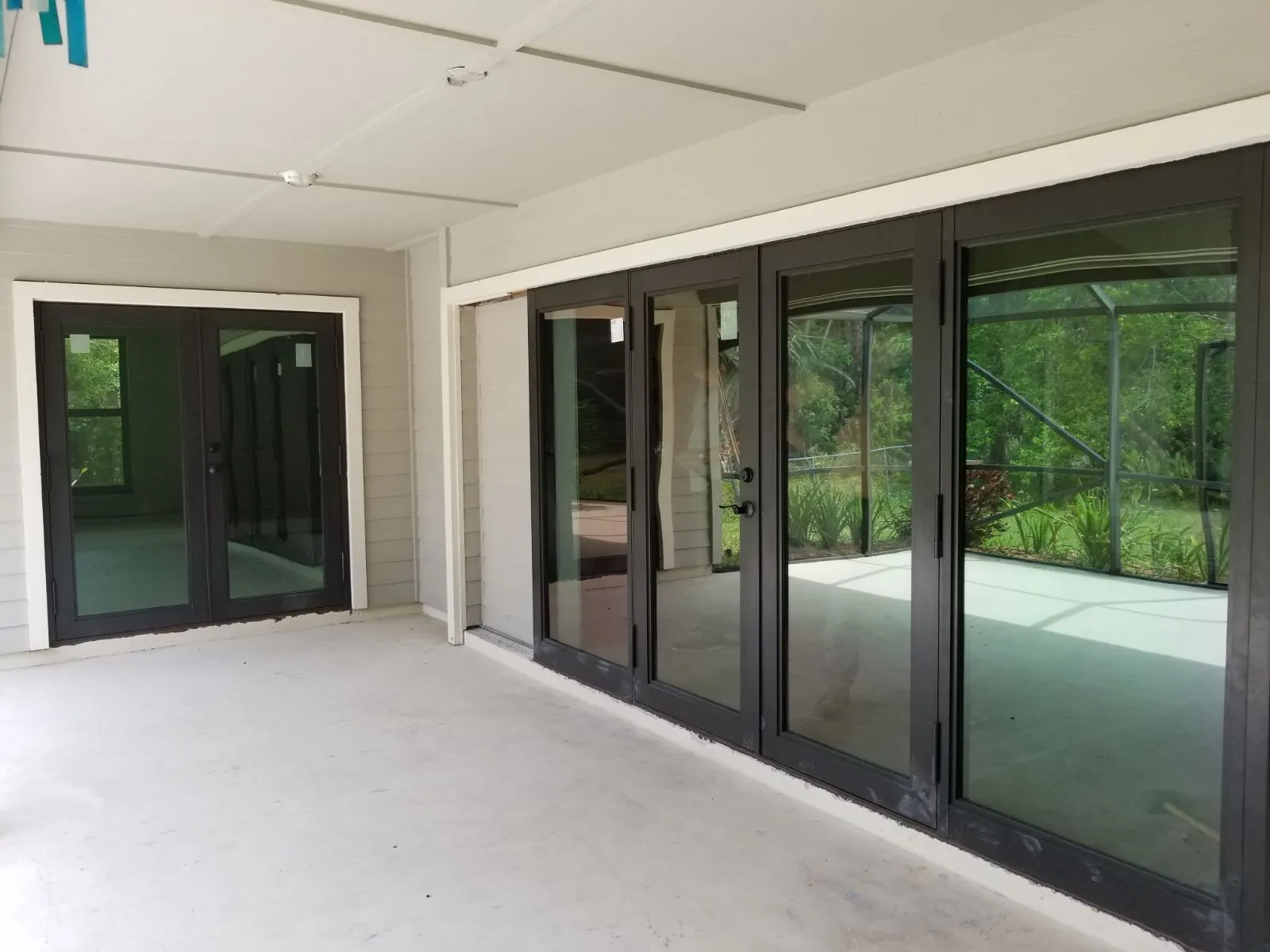 Impact windows supplied by MVC Windows & Doors, in place on a completed job